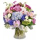 The composition and the glass-rose-alstroemeria-lilies rose..