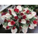 cushion size medium with anthurium and red roses in green complementary