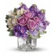 Cube de verre avec un bouquet de coll de l'eau