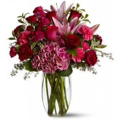 Combinazione di 12 rose rosse, gigli rosa,garofani rosa fiori d'arredo e verde complementare